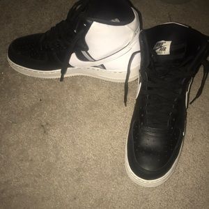 Black and white high top Nike Air Force Ones